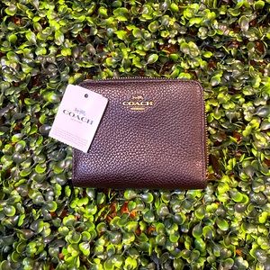 NWT mini Coach women’s black wallet